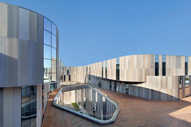 Fábrica Aimer Fashion / Crossboundaries Architects