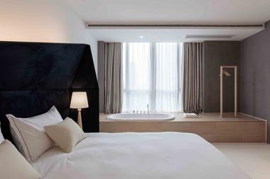 Gallery of Wheat Youth Arts Hotel / X+Living  - 15