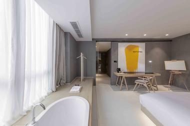 Gallery of Wheat Youth Arts Hotel / X+Living  - 24