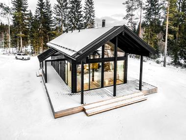 Modern Log Villa in Central Finland / Pluspuu Oy