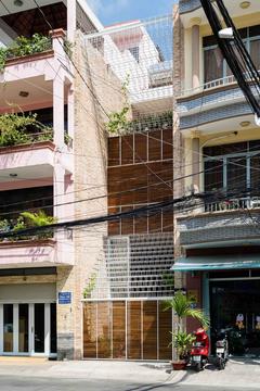 越南长屋，一个用缕金缝起来的皮革工坊 / Block Architects