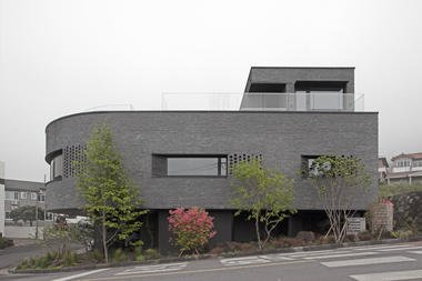 济州岛西烘洞公寓 / a round architects