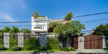 Casa de campo adosada / QBi Corp.