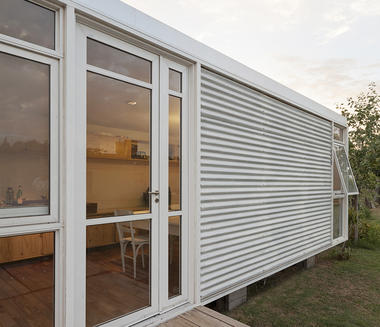 Galería de Casas de metal en Argentina: proyectos con revestimiento exterior de chapa   - 13