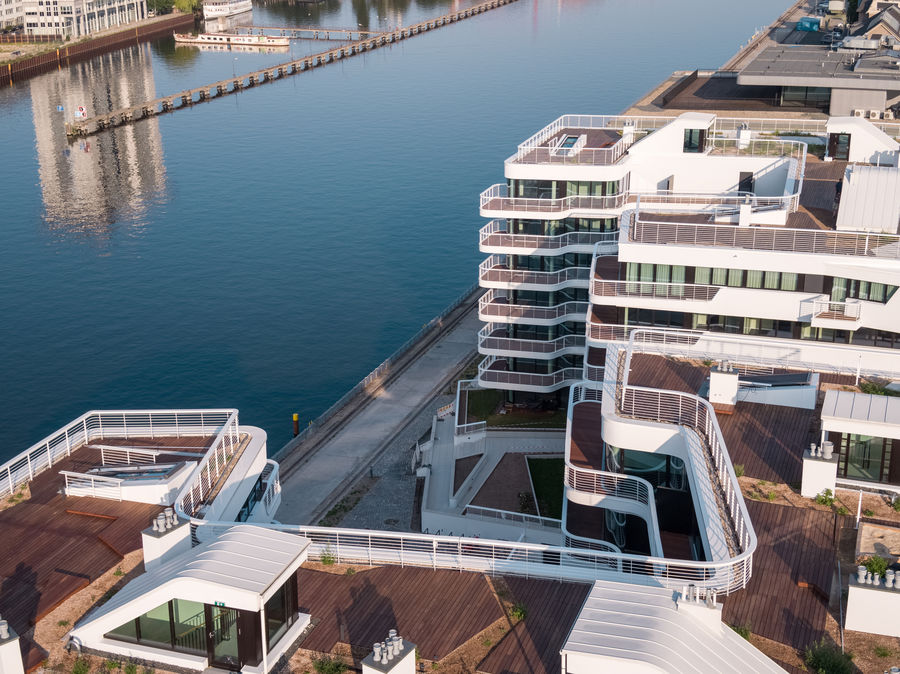 Twin seaside apartment buildings by ViorelSorin Munteanu ArchDaily