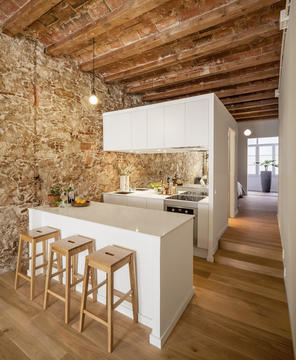 Galería de Cómo aprovechar los techos altos al renovar viviendas y edificios  - 8