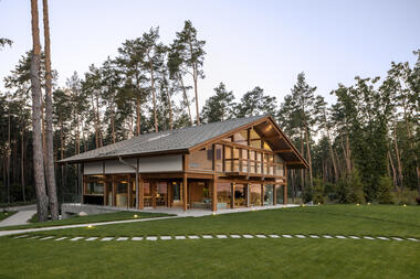 Wood and Glass Villa / Karlikova Architects