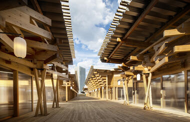 Gallery of Athletes' Village Plaza / Nikken Sekkei  - 1