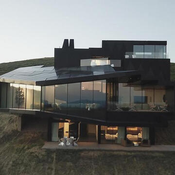 Glass Systems in Dark Chalet House from OTIIMA USA