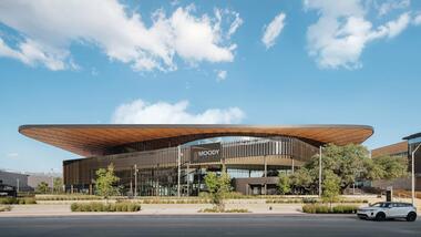 Gallery of Curved Wooden Soffit in the UT Moody Center Arena - 3
