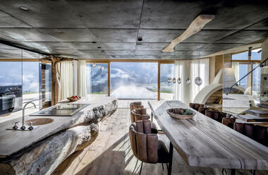 A Refuge in the Harsh Alpine Landscape: Three Connected Villas That Embrace Nature